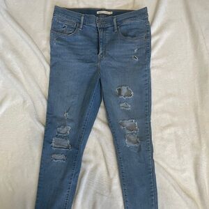 Levi skinny jeans with cutout hole detail